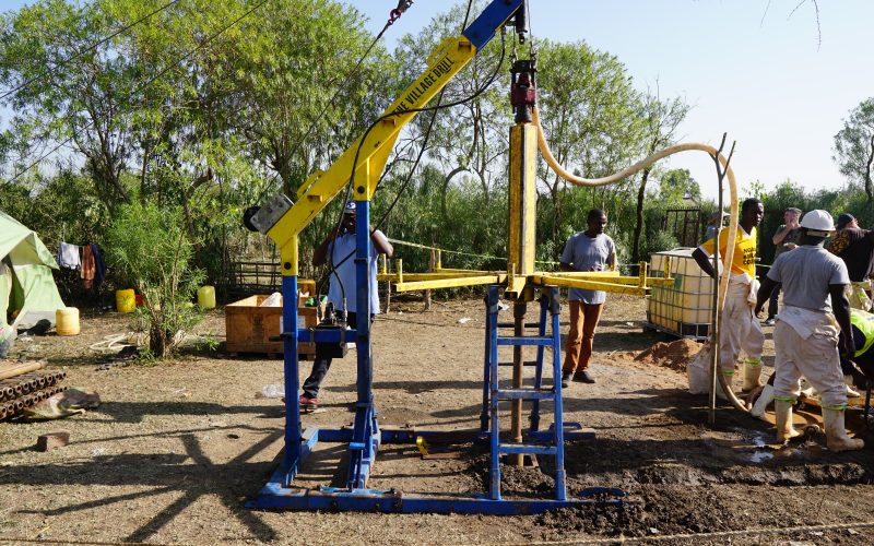 Workers using an Ulterra bit to drill for water in Kenya to offset the global water crisis
